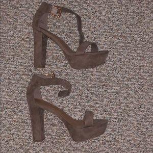 Size 8 heels worn once. Too big on me